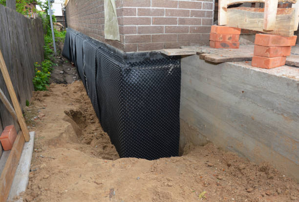 SJ Waterproofing Pros technician performing targeted Basement Waterproofing assessment in Sparks Glencoe, MD